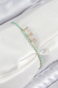Pirinç Zirkon Taşlı Mavi Boncuklu Model Gold Renk Kadın Bileklik