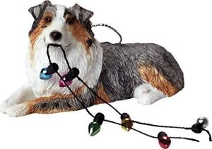 Noel Ornament, Mavi